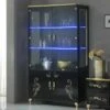 Vitrine 4 Portes Battantes Laque Noir Brillant/Or à Led - SEBORGA - L 122 X L 48 X H 203 Cm